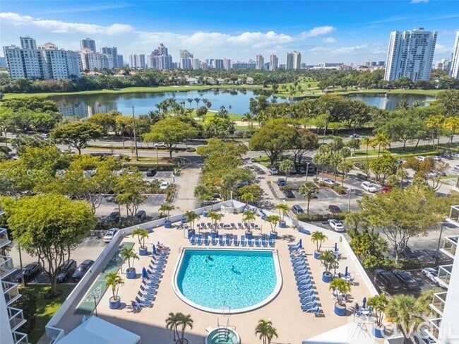 Building Photo - 3701 N Country Club Dr Unit 404