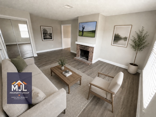 Photo - Renovated 2 Bedroom/ 1 Bath Apartment with Garage *READY NOW* Unidad D