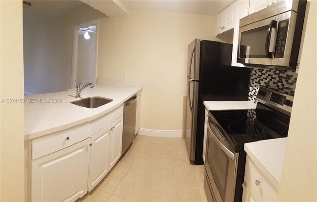 Building Photo - 8100 Geneva Ct Unit 438