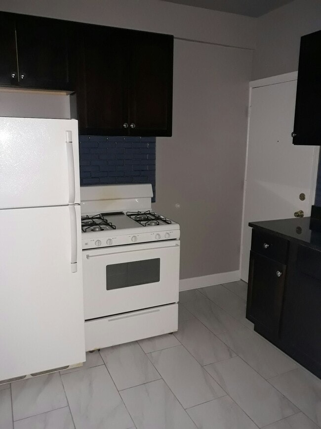 Building Photo - 6347 N Magnolia Ave Unit 2C