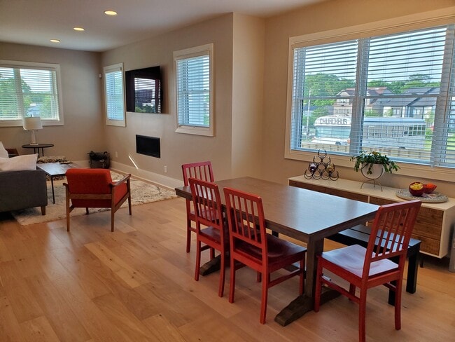 Living room has a gas fireplace with remote control for extra warmth and charm.