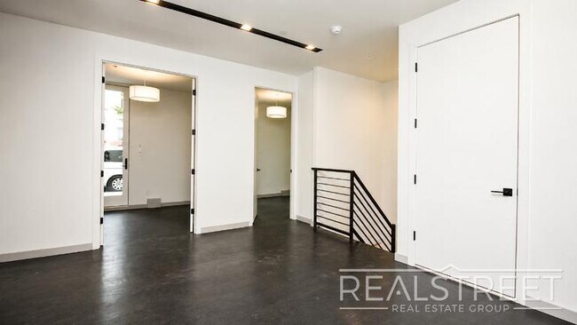 Photo - Brand-New 2-Bedroom Duplex with Private Basement & Premium Amenities Unit 1B