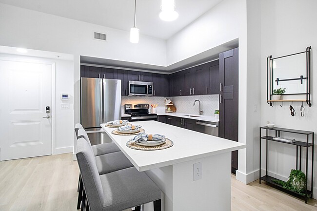 Oversized Kitchen Island at One Plantation in Plantation, FL 33324 - One Plantation Apartments