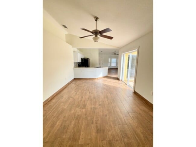 Photo - Stunning 4 Bedroom, 2 Bath Home with HUGE Patio &amp; Backyard