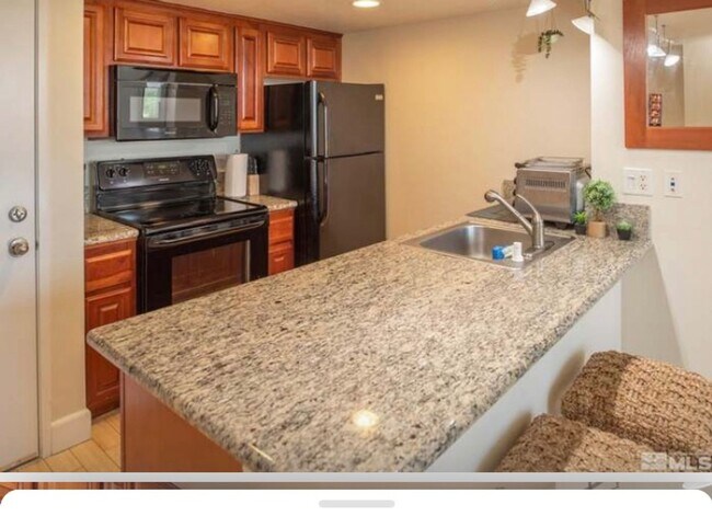 Photo - Views of the High Sierra with a downtown l... Unit 1112