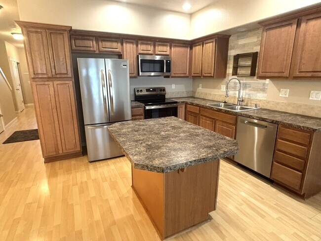 Photo - Great Location!  Well maintained Townhome , one car garage, fenced backyard!