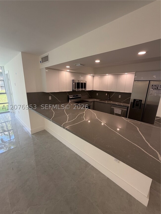 Building Photo - 801 Three Islands Boulevard Unit 102