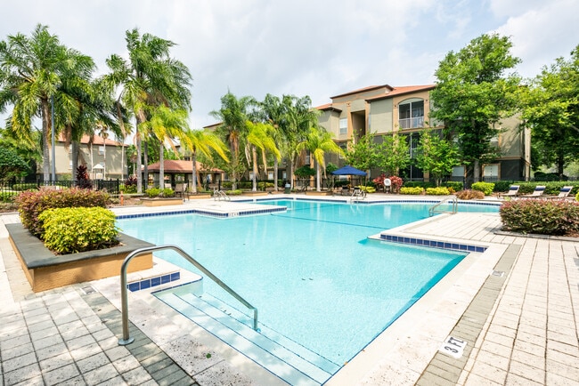 Cool off with a refreshing swim, steps from home. - Indigo West