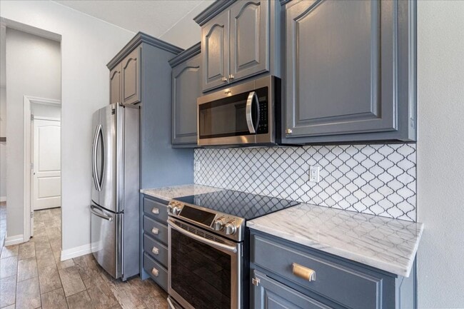 Photo - Discover this spacious 4-bedroom, 2-bath home