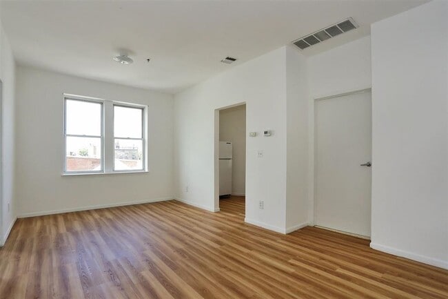 Building Photo - 203 Academy St Unit 209