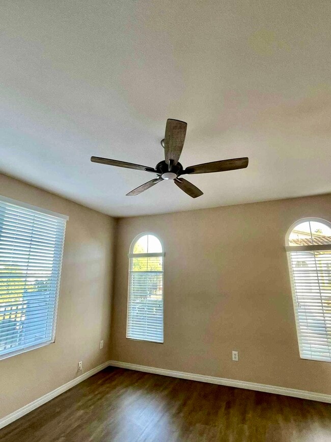Living room with new ceiling fan/light - 285 Reef Point Way Unit 6  /Pelican Cove