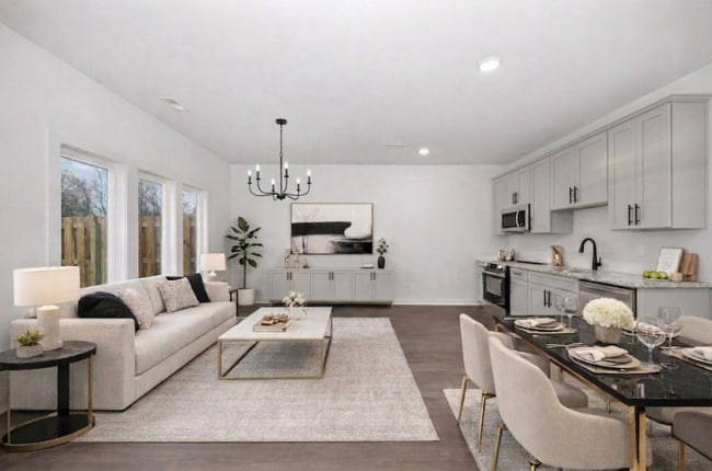 Stunning open-concept modern living and dining space with gourmet kitchen. - 2512 Freeman Rd SW
