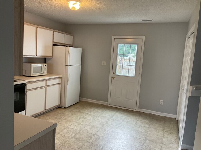 Photo - Charming two bedroom two and a half bath town home that is centrally located! Minutes to Camp Lej...