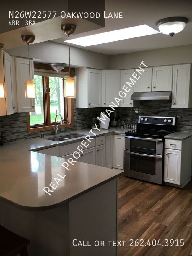 Building Photo - N26W22577 Oakwood Ln Rental