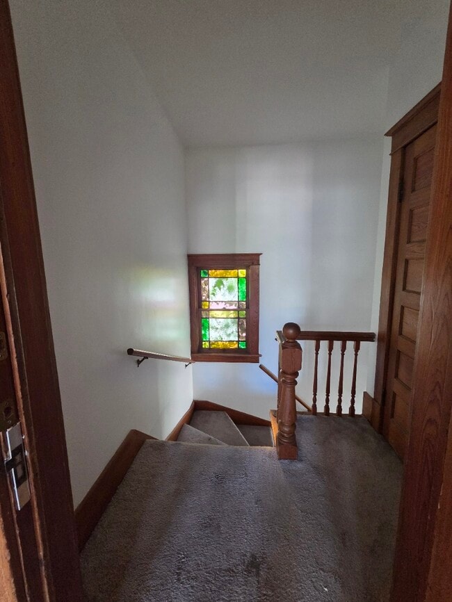 Stairway entryway with stainglass window - 2 Maple Ave