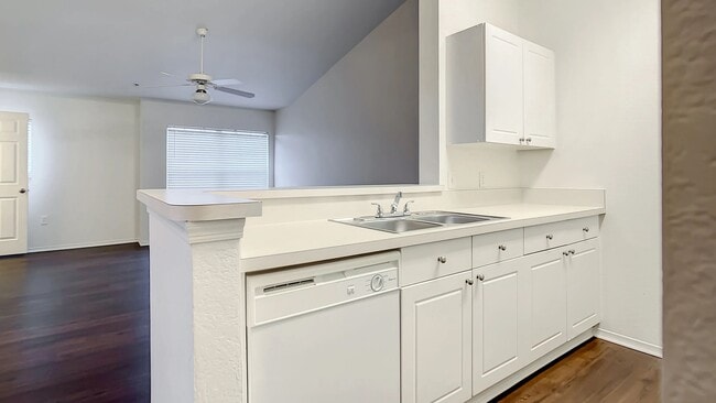 Step into timeless kitchen elegance where our kitchens feature generous countertop space and a versatile breakfast bar that looks out onto the living room.