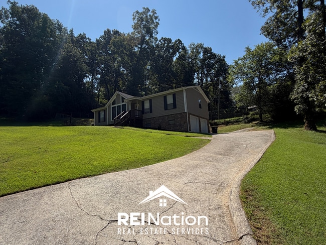 Photo - ACT FAST! 3BR/2BA in Birmingham | Vaulted Ceilings & Fireplace | 2-Car Garage!