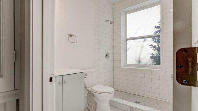 Photo - Spacious 4-Bedroom, 2-Bathroom Apartment i... Unit 2
