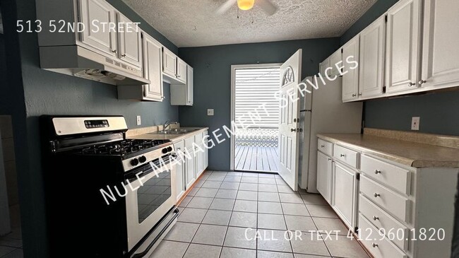 Building Photo - 513 52nd St