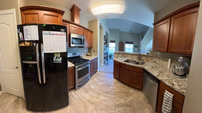New cherry wood and granite kitchen - 9050 Double R Blvd