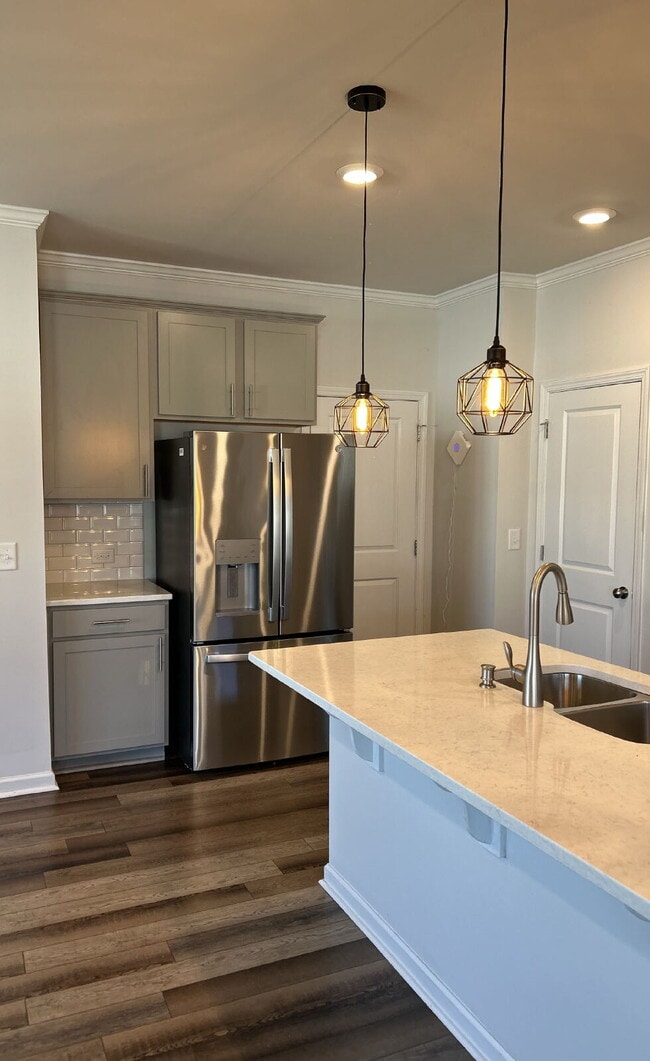 Photo - Modern townhome with high-end finishes throughout, minutes to 540 and walkable to great shopping.