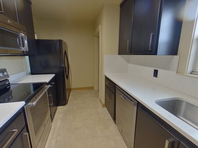 Photo - 711-719 East 24th Ave. Unidad 711