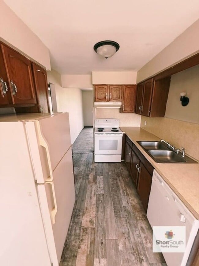 Photo - Updated 2 bed 1 bath main floor apartment with covered detached garage