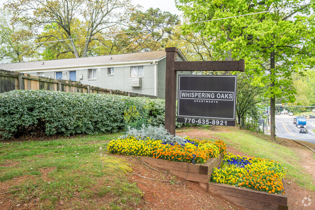 Building Photo - Whispering Oaks Rental