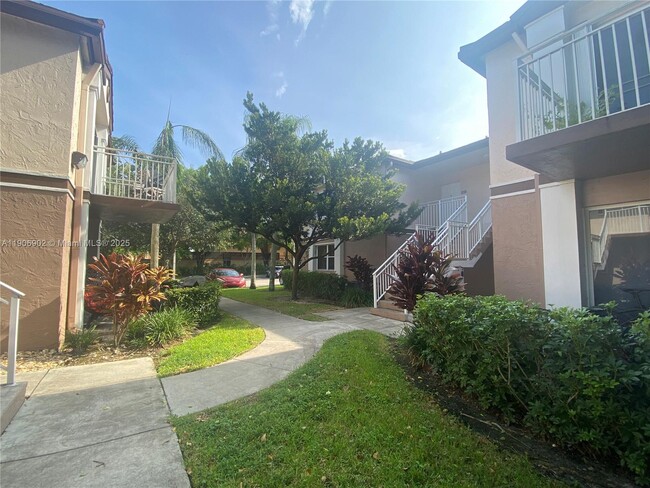 Building Photo - 11232 SW 12th St Unit 101