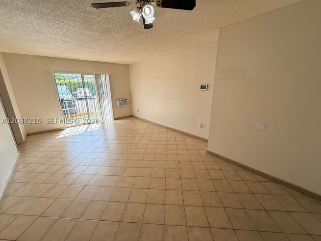 Building Photo - 4713 NW 7th St Unit 108-1