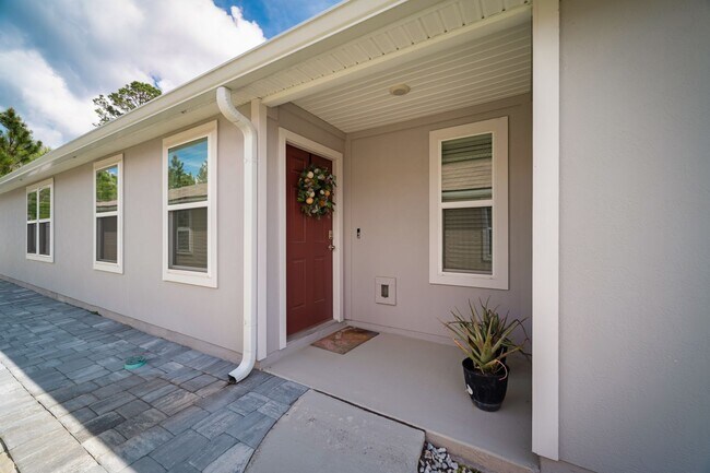 Photo - Spacious 4-Bedroom Home with Fenced Yard & Community Amenities