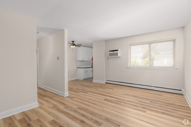 2BR, 1BA - 750SF - Living Room - Pear Tree Court