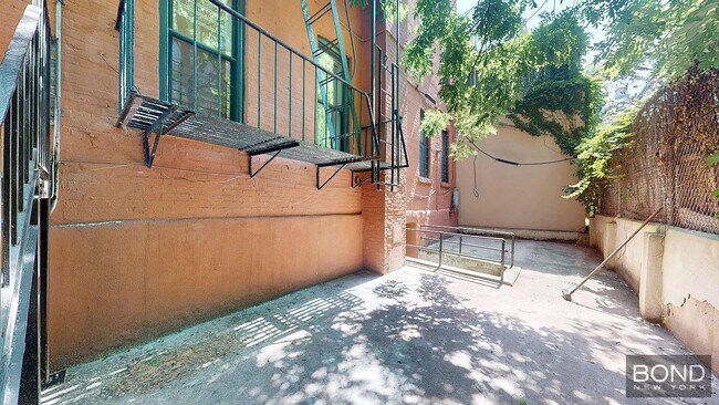 Photo - 312 E 91st St Apartment Unit 1R