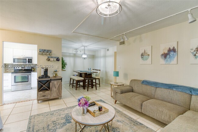 Building Photo - 3095 N Oakland Forest Dr Unit 104