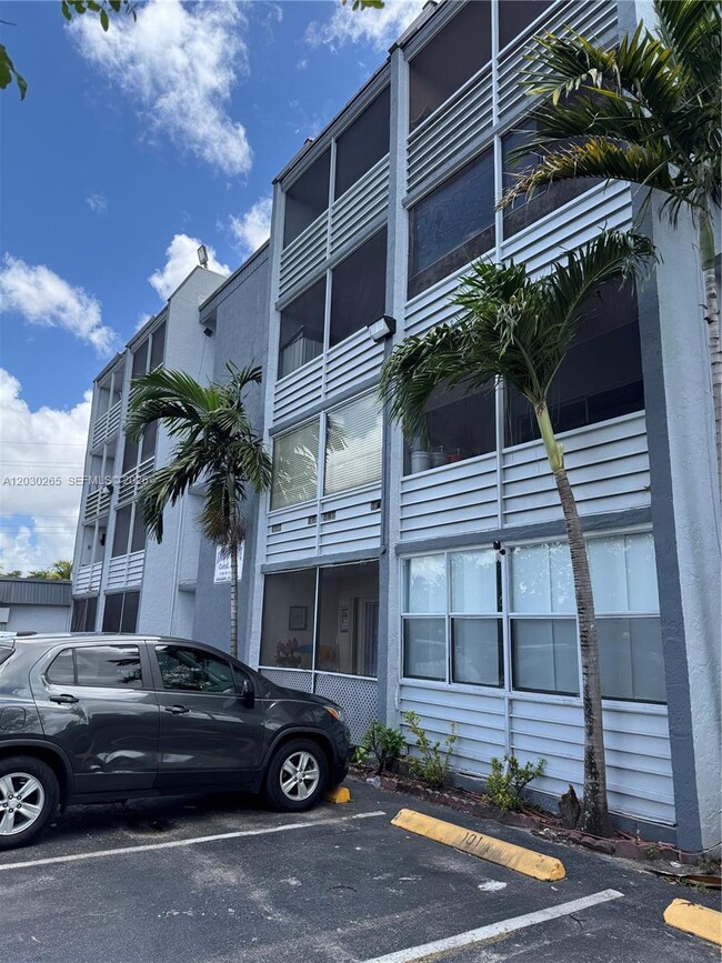 Building Photo - 7105 W 13th Ave Unit 403