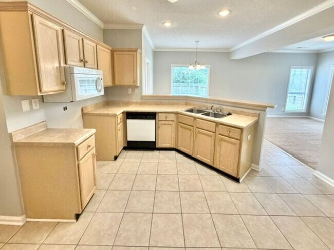 Spacious 4 bedroom with den available now in Cordova.