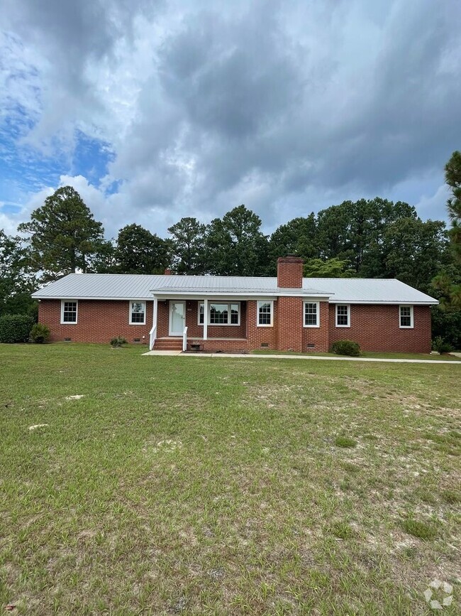 Building Photo - Charming 4-Bedroom Home on Rocky Fork Chur...