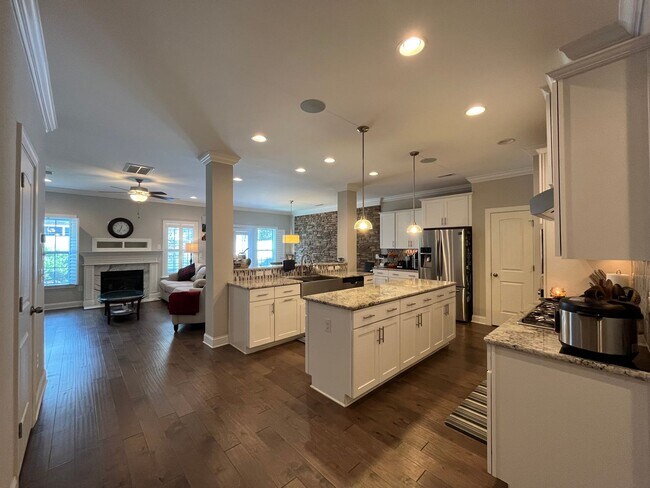 Photo - Exceptional 4BD, 2.5BA Cary Townhome with 2-Car Garage, Bonus 2nd Floor Living Space, and Private...