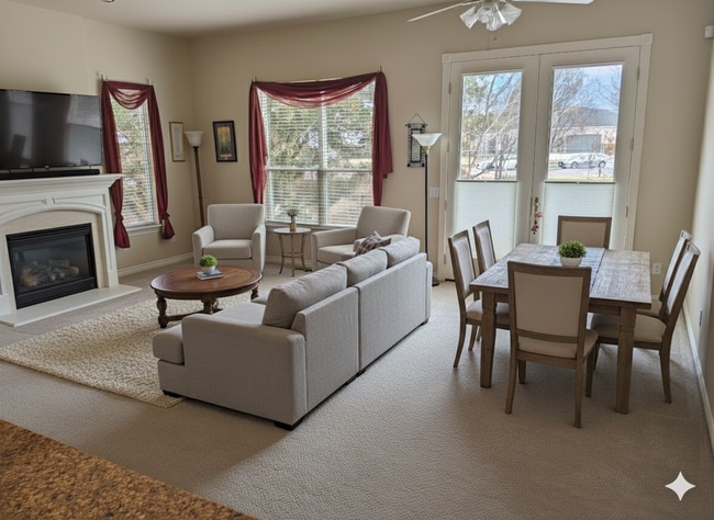 Upstairs Living Room with Fireplace and Deck Access - 9287 S Avignon Pl