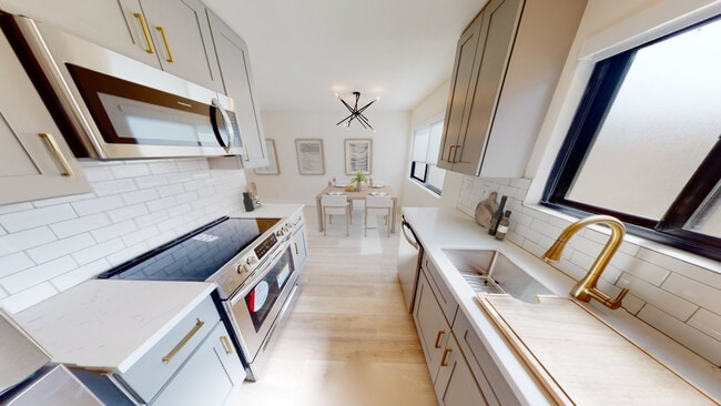 Kitchen and Dining Area - Woodman Apartments