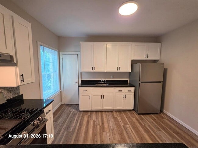 Building Photo - 1419 S Perry St Unit M