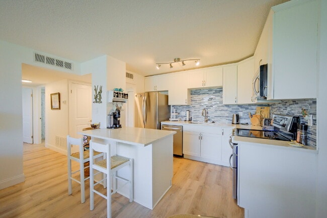 Photo - Available February 1st, 2026! 
Cocoa Beach Waterfront Condo Unit #209