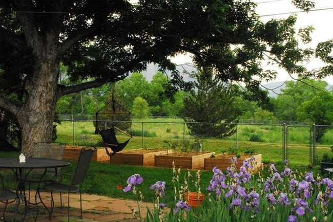 Building Photo - Enjoy Amazing Flatiron Views, Abundant Space, and A Large Backyard in this 5 Bedroom Home