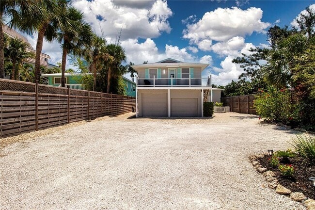 Building Photo - 9033 Midnight Pass Rd Rental
