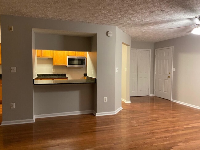 Living done eat-in space - 3712 Excalibur Ct Condo Unit 201