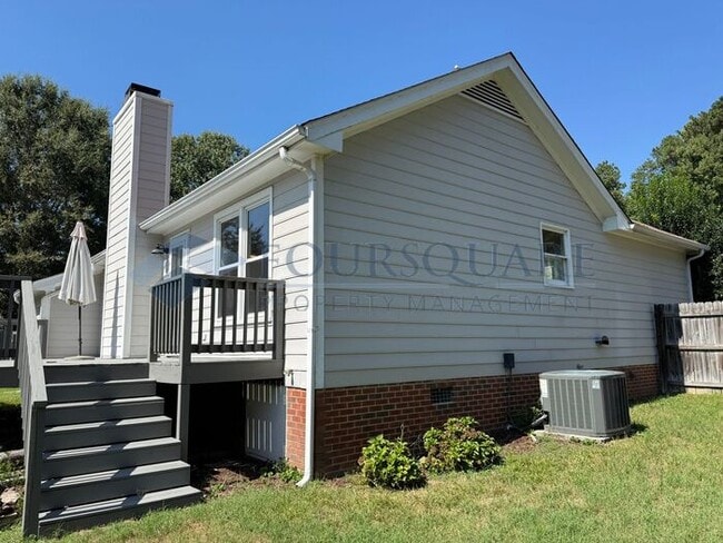 Charming Ranch Home with Large Deck, & Fenced Yard in Raleigh, NC