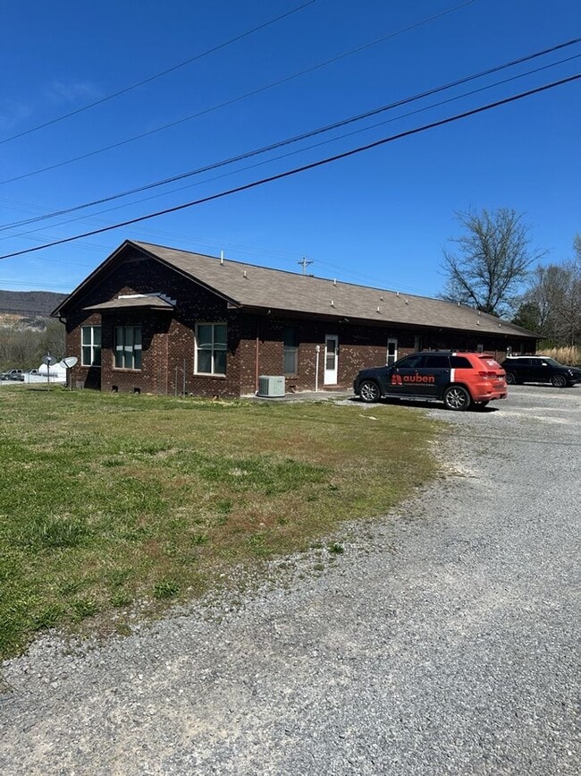 Building Photo - Charming, Light-Filled Retreat with Quiet Comfortable Living