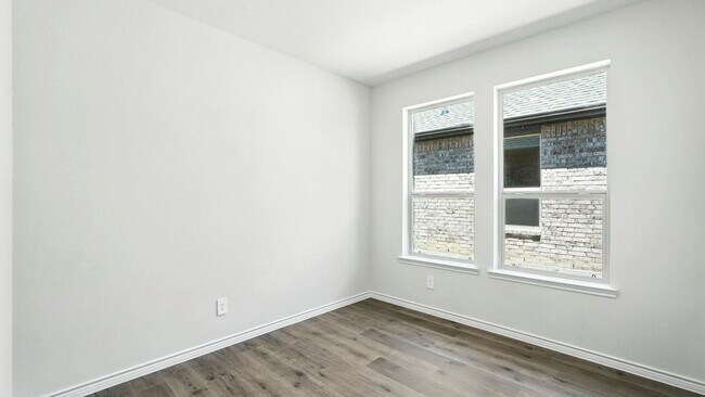Photo - Welcome to this stunning 4-bed, 2-bath home with flex space, style, and comfort throughout!