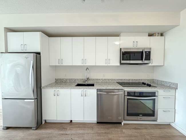Photo - 450-458 8 Ave SE Unit 1407