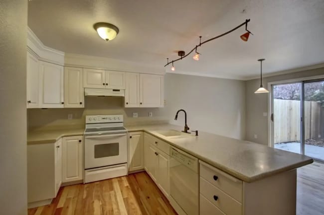 Photo - Spacious 3 bed Townhome with Fenced Yard, Garage, & Community Pool in Prime Boise Location!